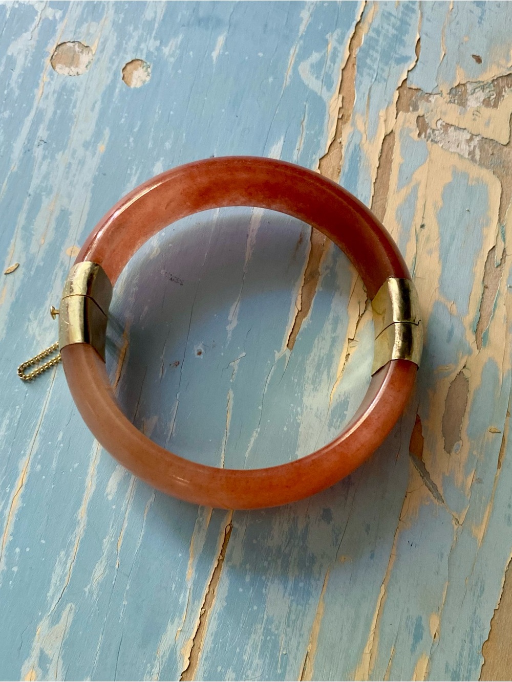 Elegant Orange Jade Bangle Bracelet with Gold Accents
